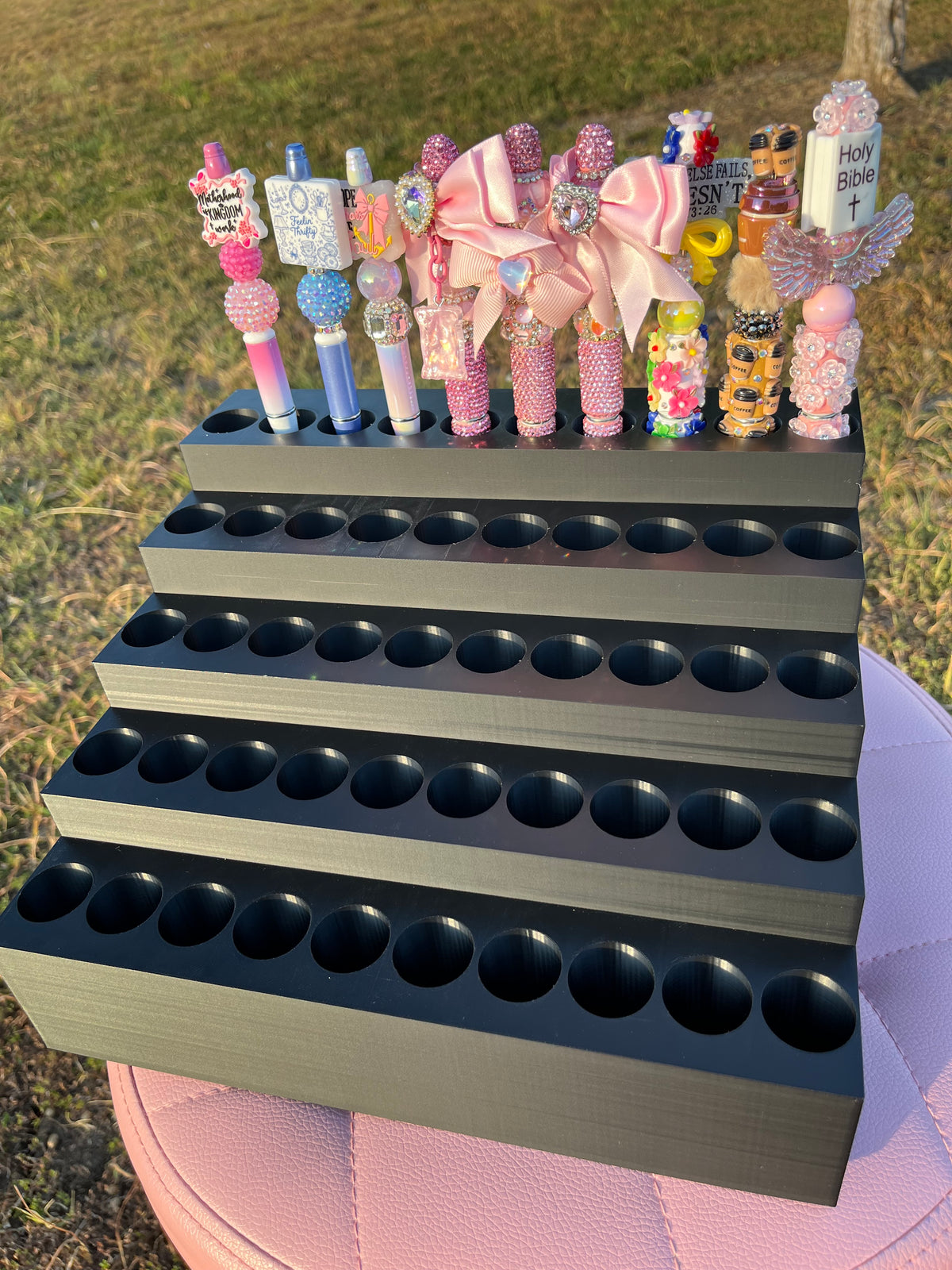 Universal Pen Display for 50 Pens with “lock-in” feature