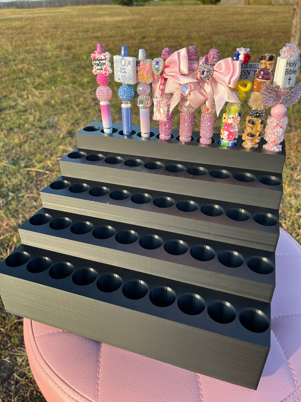 Universal Pen Display for 50 Pens with “lock-in” feature
