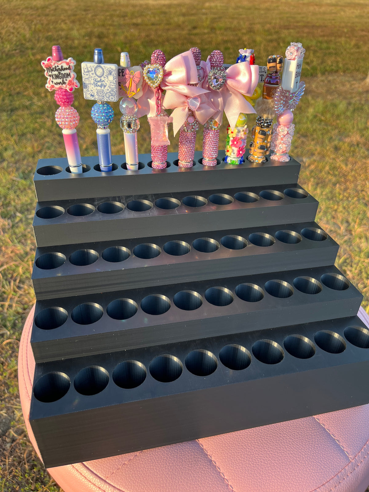 Universal Pen Display for 50 Pens with “lock-in” feature