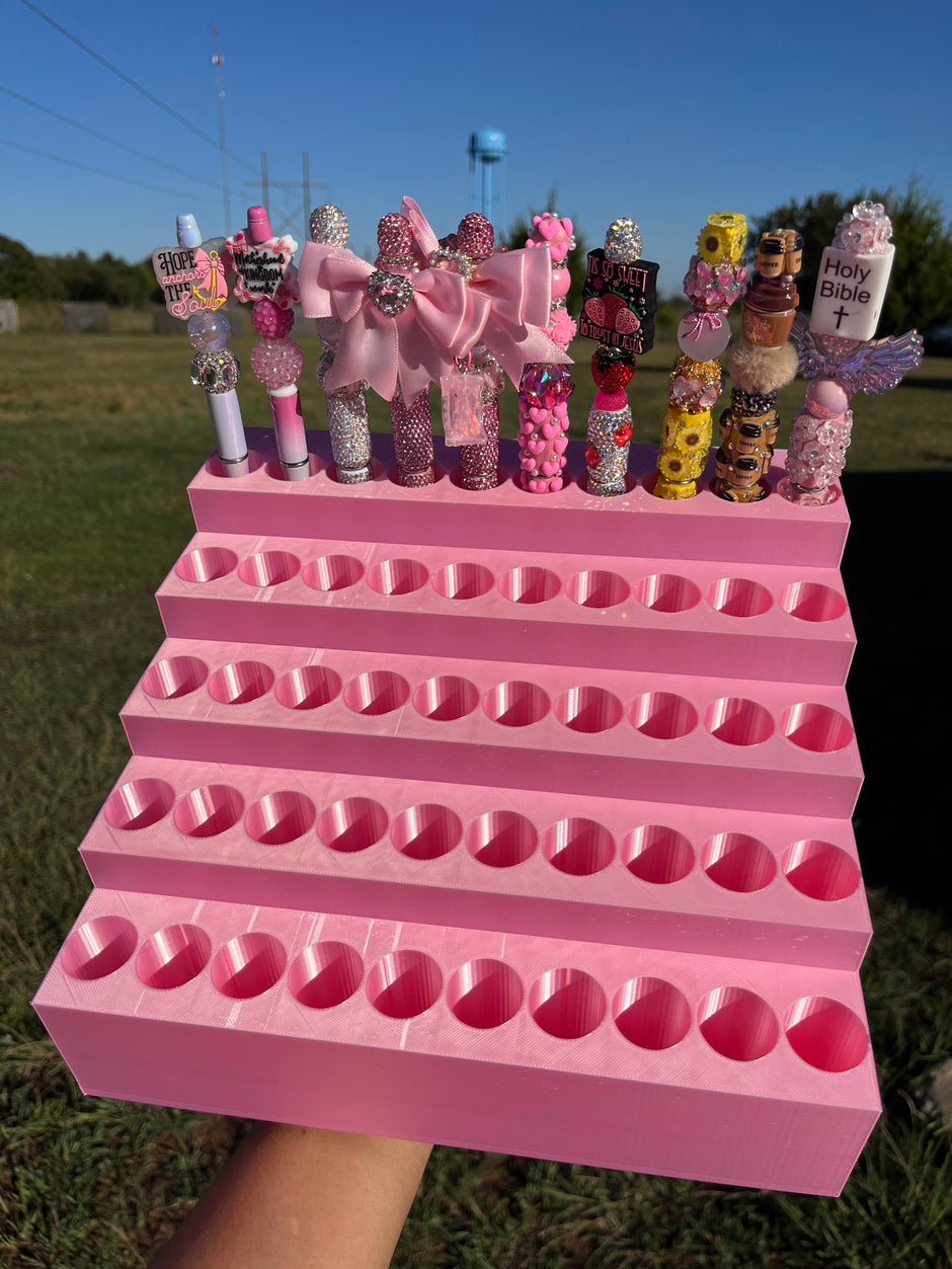 Universal Pen Display for 50 Pens with “lock-in” feature