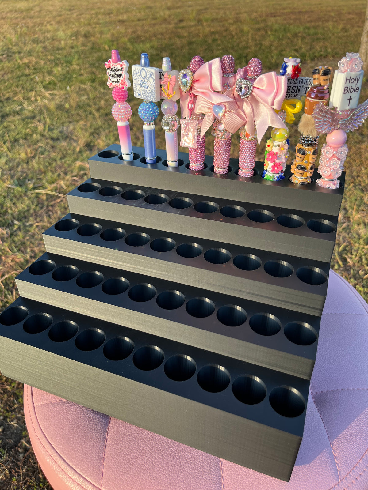 Universal Pen Display for 50 Pens with “lock-in” feature
