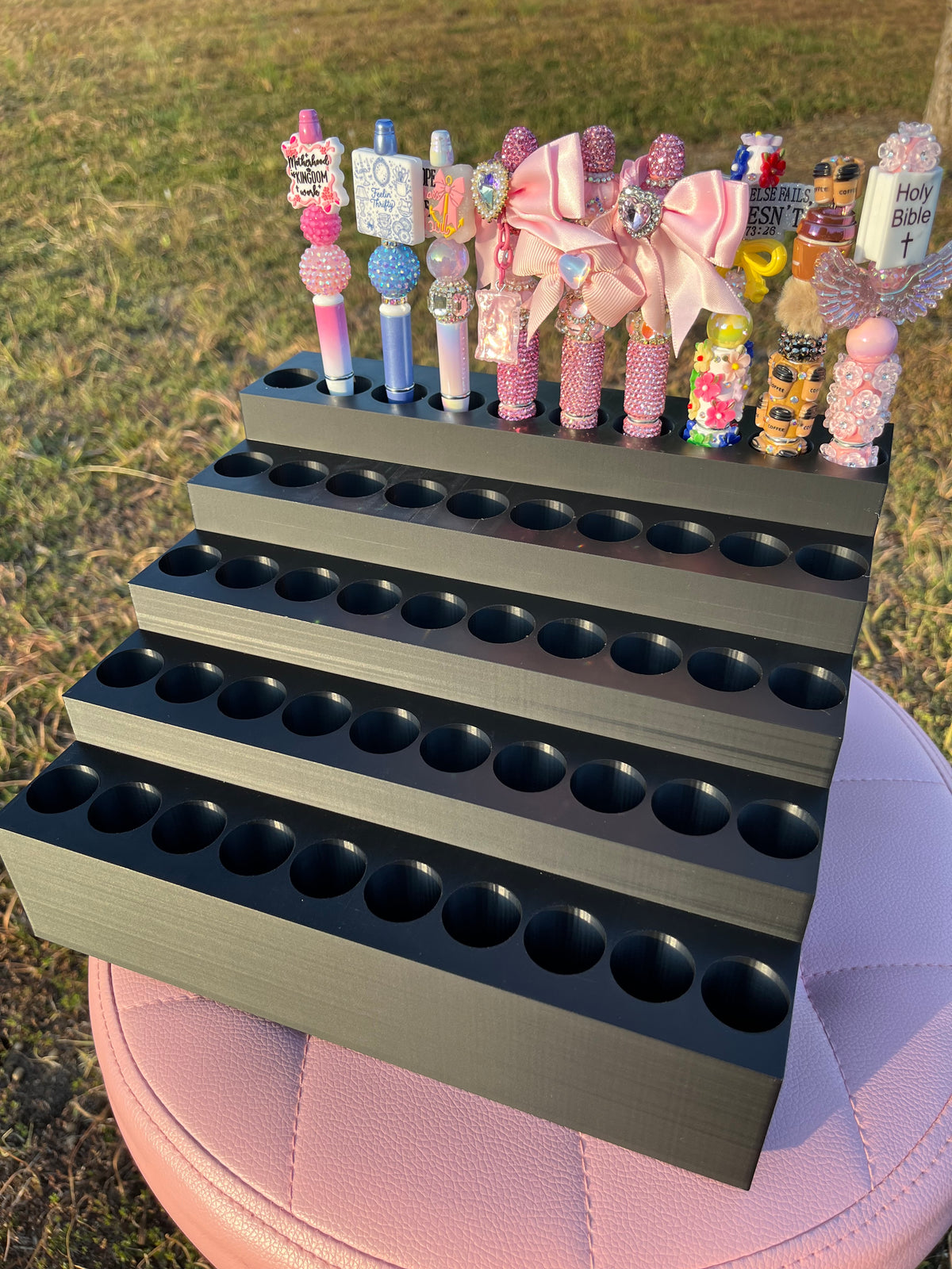 Universal Pen Display for 50 Pens with “lock-in” feature