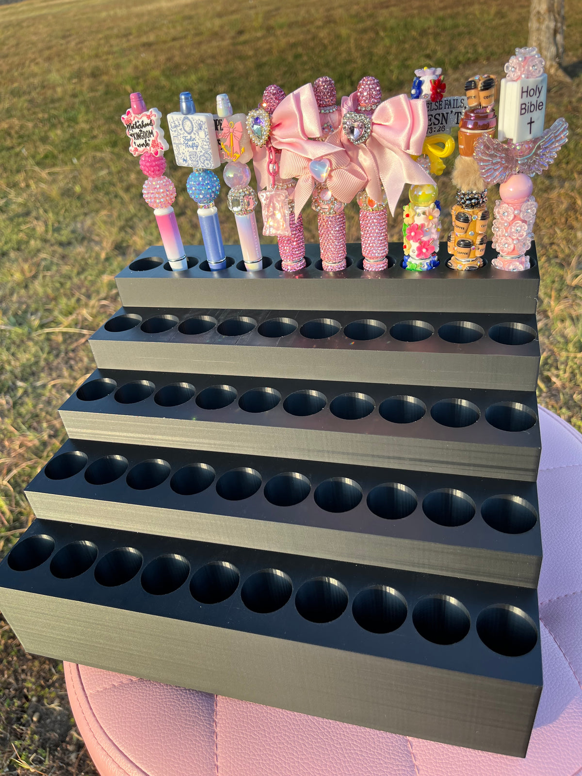 Universal Pen Display for 50 Pens with “lock-in” feature